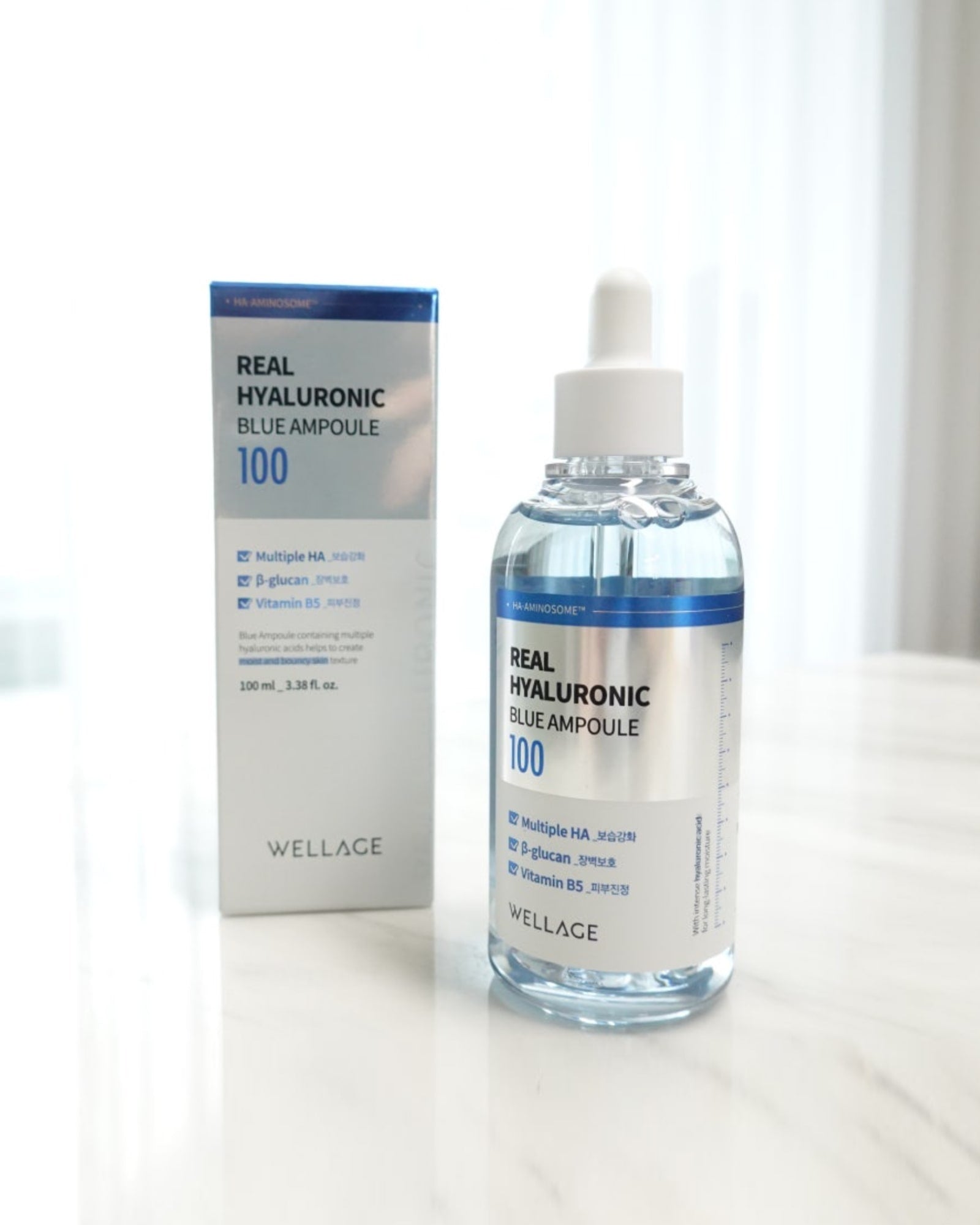 Wellage Real Hyaluronic Blue Ampoule 100ml bottle with a lid with a dropper.