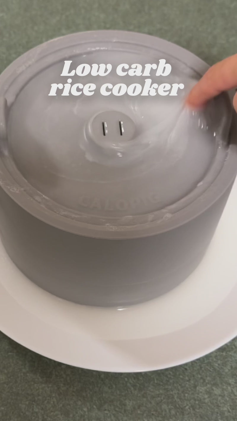 Starchy water captured on the lid and the bottom container after cooking rice using the low carb microwave rice cooker.